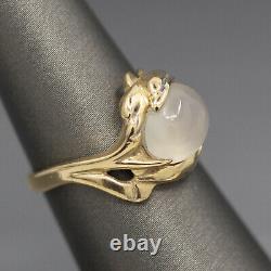 Glowing Moonstone and Playful Dolphin Ring in 14k Yellow Gold